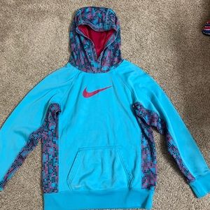 A Blue Nike hoodie. Therma-fit. Youth XL